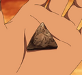 《无职转生》中鲁迪在旅途中经过的某个国家使用的货币是一种三角形硬币，称为“碎铁钱”