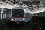 201604 DC01-112 enters Pengpu Xincun Station.jpg