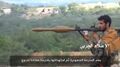 叙利亚战场照片，照片中的男子端着一杆上了串联聚能破甲弹的RPG-7